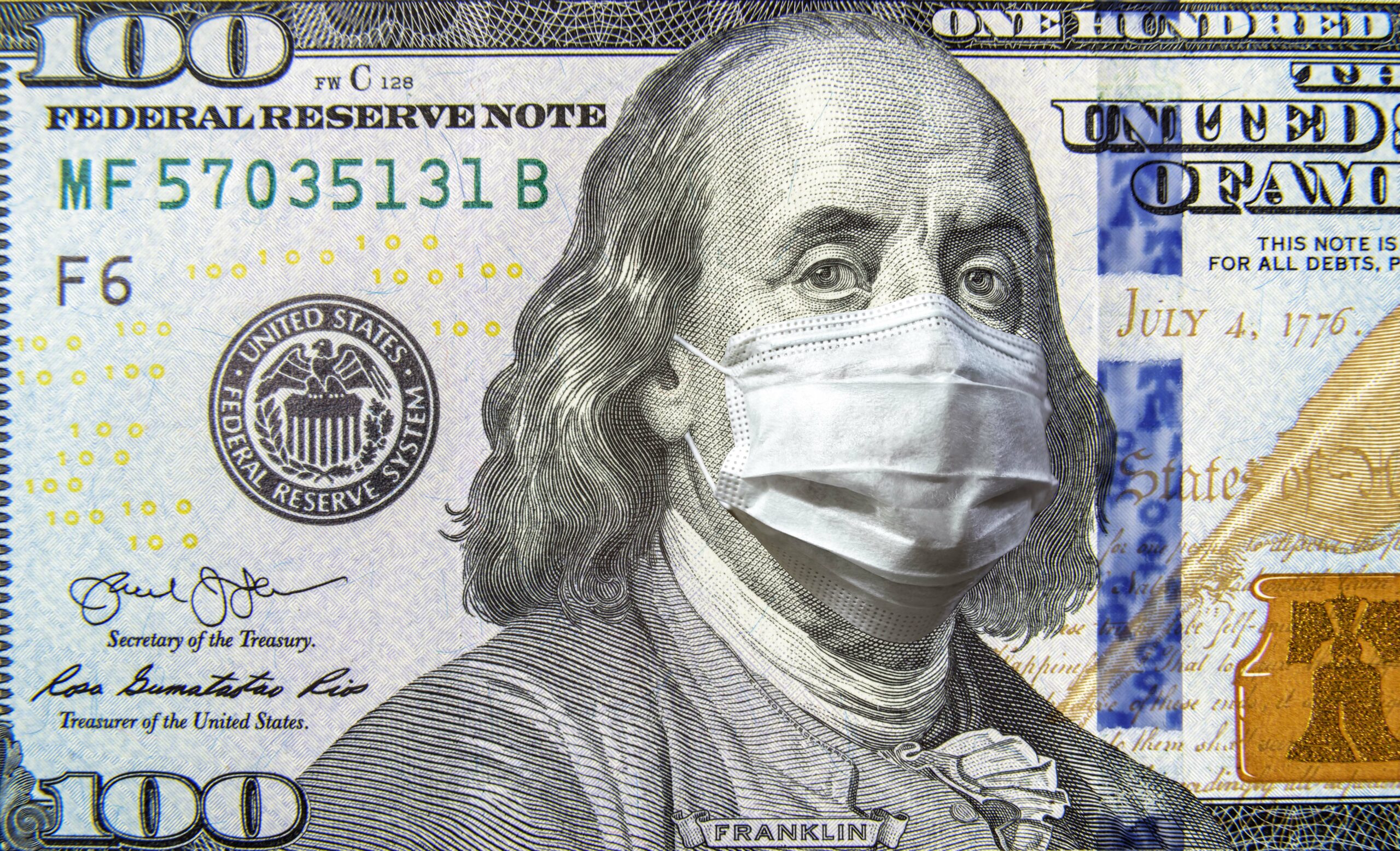 Benjamin Franklin on the $100 bill wearing a mask